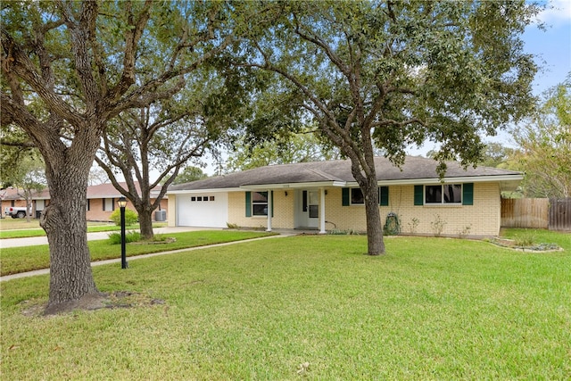 ranch-style house with a front lawn and a garage