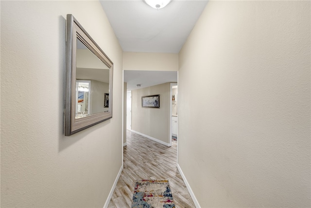 hall featuring light hardwood / wood-style floors