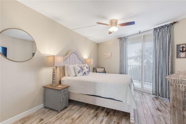 bedroom with light wood-type flooring and ceiling fan