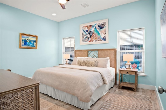 bedroom featuring ceiling fan and light wood-type flooring