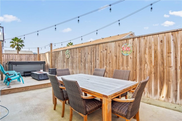 view of patio with a hot tub