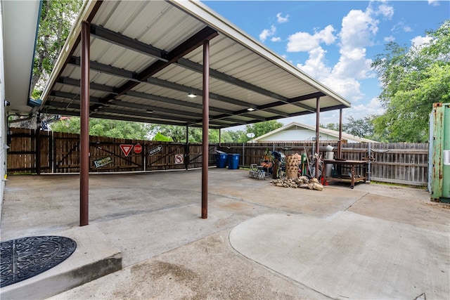 view of patio featuring a carport