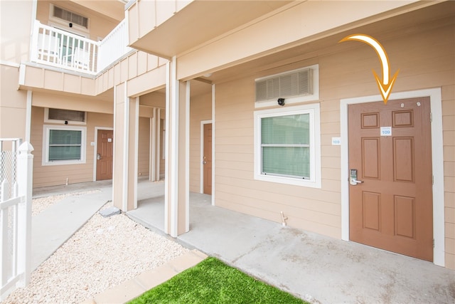 doorway to property featuring a balcony