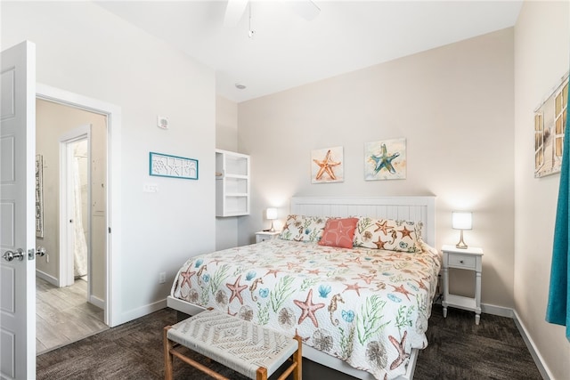 bedroom featuring dark wood-type flooring and ceiling fan