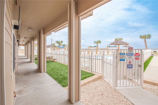 view of patio with a community pool