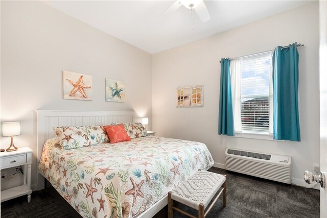 carpeted bedroom with ceiling fan and a wall mounted air conditioner