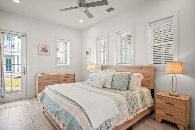 bedroom with access to exterior, recessed lighting, visible vents, ceiling fan, and light wood-type flooring