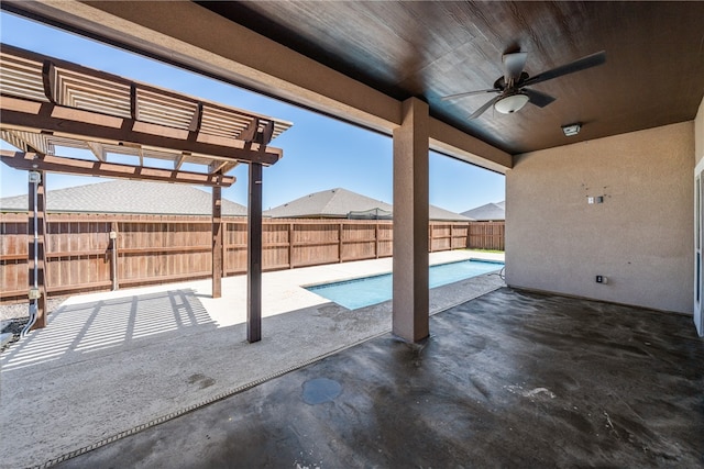 view of pool featuring a patio, a pergola, and ceiling fan