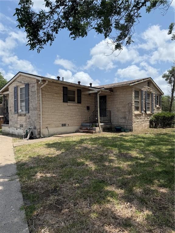 2802 Devon Dr, Corpus Christi, TX 78404 - single story home featuring stone siding and a front yard