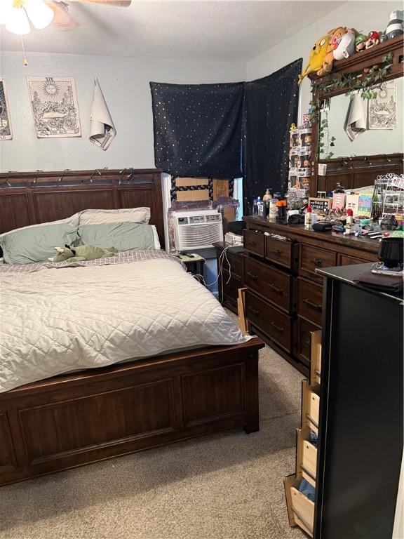 2802 Devon Dr, Corpus Christi, TX 78404 - bedroom with cooling unit, light carpet, and ceiling fan