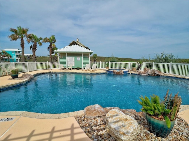 4820 Sanibel Ln, Port Aransas, TX 78373 - view of swimming pool with a gazebo, a pool with connected hot tub, and fence