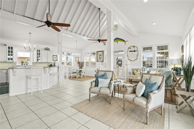 4820 Sanibel Ln, Port Aransas, TX 78373 - living room with recessed lighting, light tile patterned floors, ceiling fan with notable chandelier, and beamed ceiling