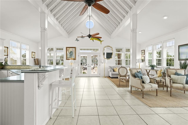 4820 Sanibel Ln, Port Aransas, TX 78373 - living area featuring light tile patterned floors, french doors, plenty of natural light, and a ceiling fan