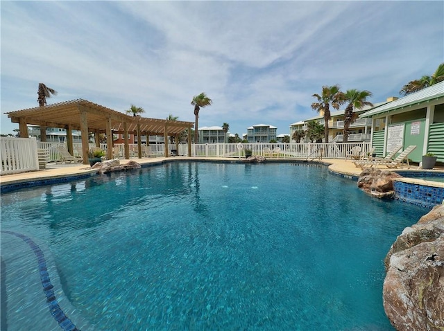 4820 Sanibel Ln, Port Aransas, TX 78373 - community pool with fence and a pergola