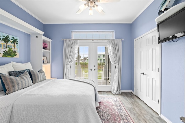 4820 Sanibel Ln, Port Aransas, TX 78373 - bedroom featuring crown molding, french doors, access to exterior, baseboards, and wood finished floors