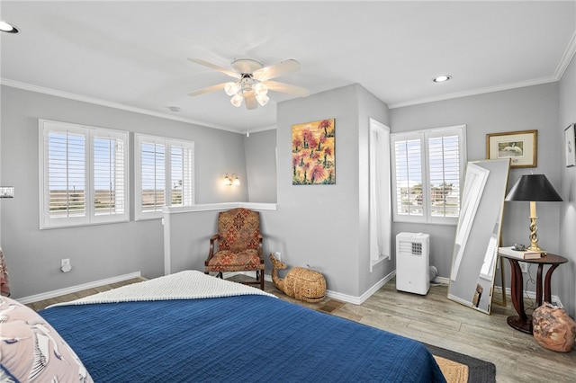 4820 Sanibel Ln, Port Aransas, TX 78373 - bedroom featuring crown molding, recessed lighting, wood finished floors, and baseboards