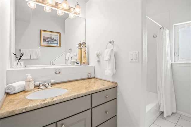 4820 Sanibel Ln, Port Aransas, TX 78373 - full bath featuring tile patterned floors, tasteful backsplash, shower / bath combo, and vanity
