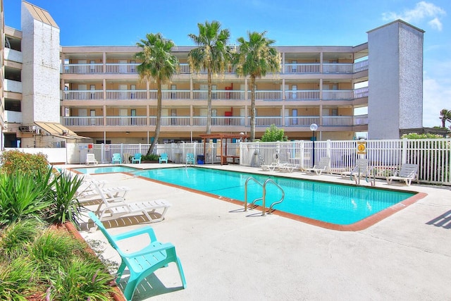 view of pool featuring a patio