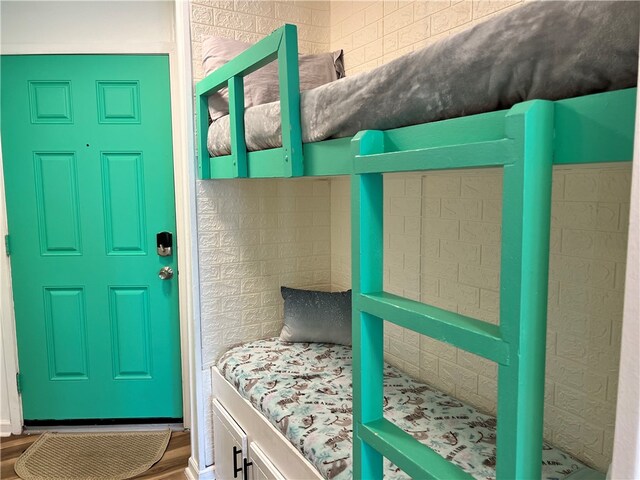 bedroom featuring hardwood / wood-style flooring