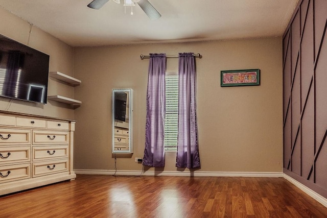112 E 6th St, Bishop, TX 78343 - interior space with baseboards and wood finished floors