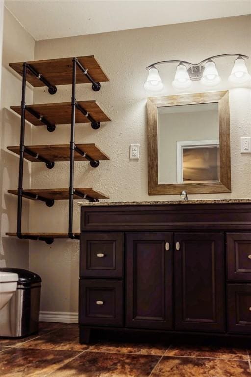 112 E 6th St, Bishop, TX 78343 - bathroom with toilet and vanity