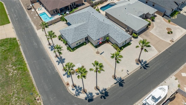 drone / aerial view of a pool area