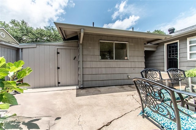 419 Peerman Pl, Corpus Christi, TX 78411 - view of patio featuring outdoor dining area