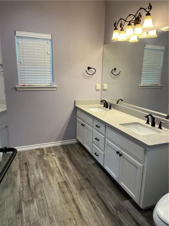 doorway to property with a ceiling fan, a wooden deck, and fence