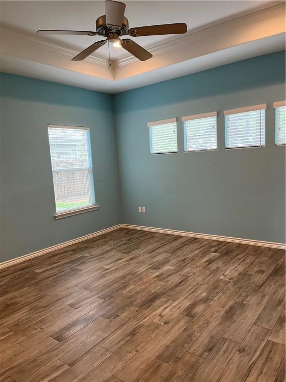 laundry room featuring baseboards, cabinet space, and hookup for an electric dryer