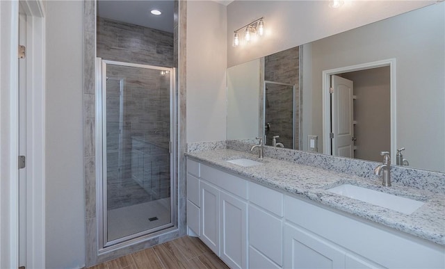 6214 Sadie St, Corpus Christi, TX 78415 - full bath featuring a stall shower, double vanity, and recessed lighting