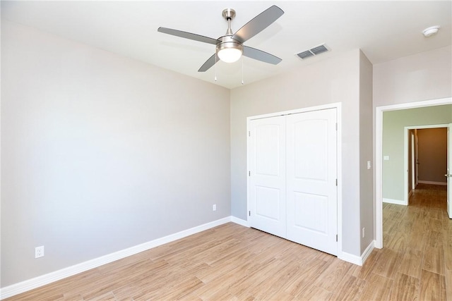 6214 Sadie St, Corpus Christi, TX 78415 - unfurnished bedroom featuring light wood-style flooring, a closet, and a ceiling fan
