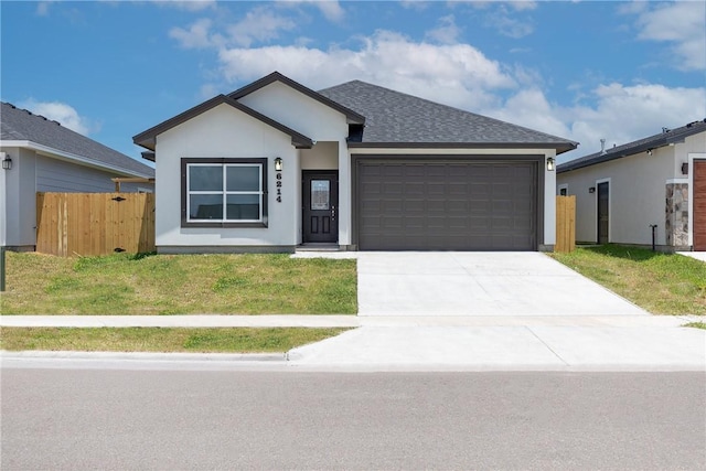 6214 Sadie St, Corpus Christi, TX 78415 - ranch-style home with an attached garage, driveway, and a shingled roof