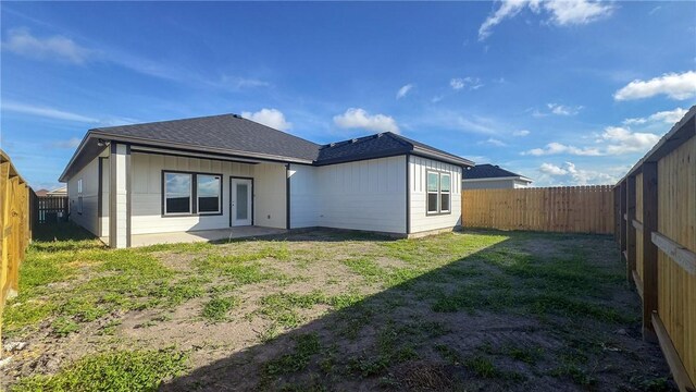6214 Sadie St, Corpus Christi, TX 78415 - back of house featuring a fenced backyard and roof with shingles