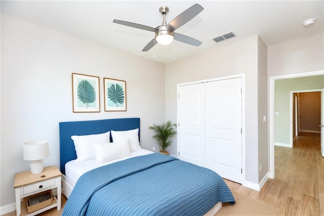 6214 Sadie St, Corpus Christi, TX 78415 - bedroom featuring a closet, light wood-style floors, and a ceiling fan