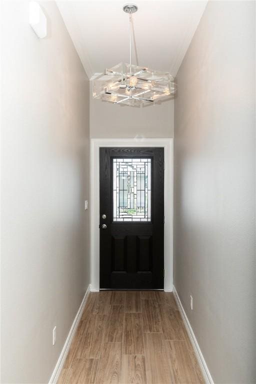 6214 Sadie St, Corpus Christi, TX 78415 - entrance foyer featuring a chandelier and wood finished floors