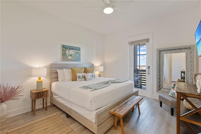 bedroom with ceiling fan, baseboards, light wood-style floors, and access to exterior