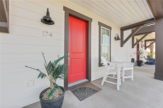 entrance to property with a porch