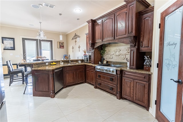 kitchen with stainless steel appliances, decorative light fixtures, sink, decorative backsplash, and dark stone countertops