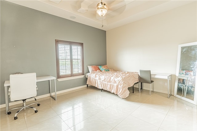 bedroom featuring ceiling fan and tile patterned floors