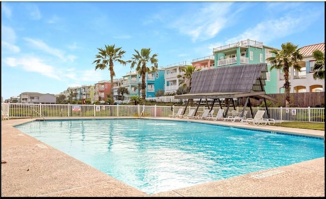 view of swimming pool featuring a patio area