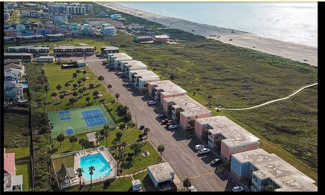 bird's eye view with a beach view and a water view