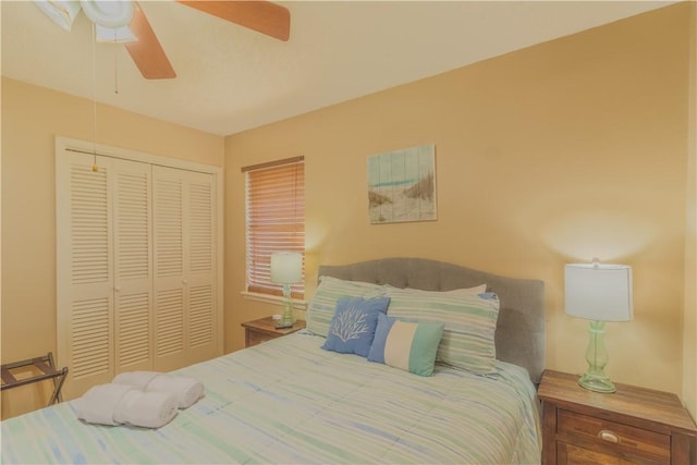 122 Palm Dr, Rockport, TX 78382 - bedroom with a closet and a ceiling fan
