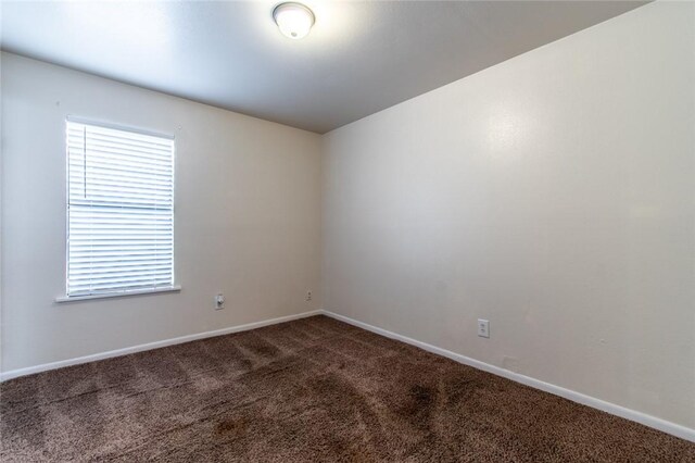 5921 Riley Dr, Corpus Christi, TX 78412 - spare room featuring carpet floors and baseboards