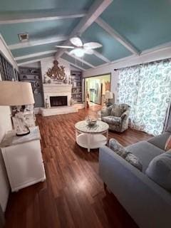 1638 W Palm Dr, Aransas Pass, TX 78336 - living area with ceiling fan, a fireplace with raised hearth, and wood finished floors
