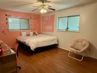 1638 W Palm Dr, Aransas Pass, TX 78336 - bedroom featuring wood finished floors and ceiling fan