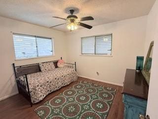 1638 W Palm Dr, Aransas Pass, TX 78336 - bedroom featuring baseboards and wood finished floors