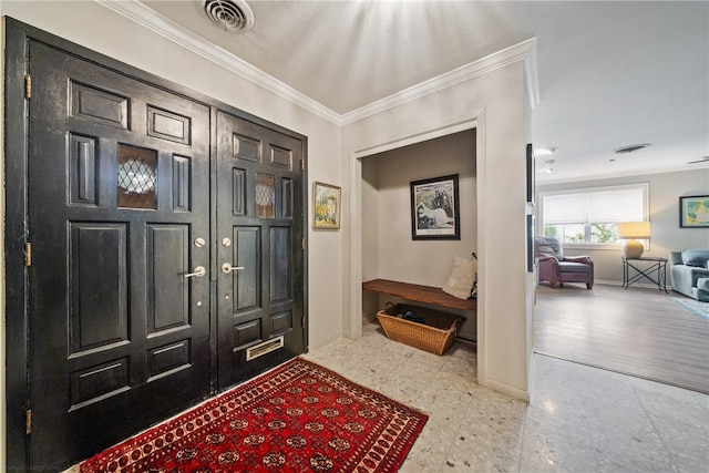 foyer with ornamental molding