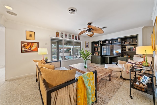 living room featuring ornamental molding and ceiling fan