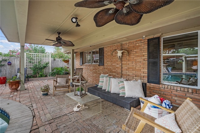 view of patio / terrace featuring ceiling fan