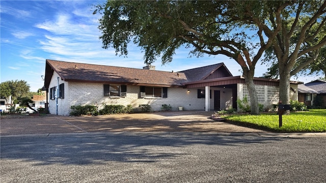 ranch-style home with a garage